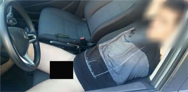 Homem  flagrado dormindo pelado dentro de carro em Cuiab